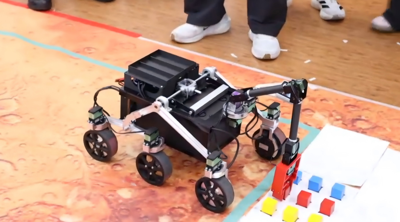 Student-built Mars rover during simulated mission testing at Tsinghua University.